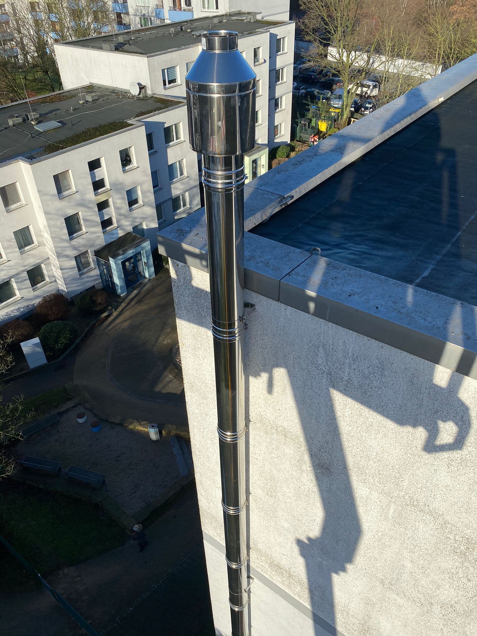 Sanierung Betonschornstein – Schulkomplex